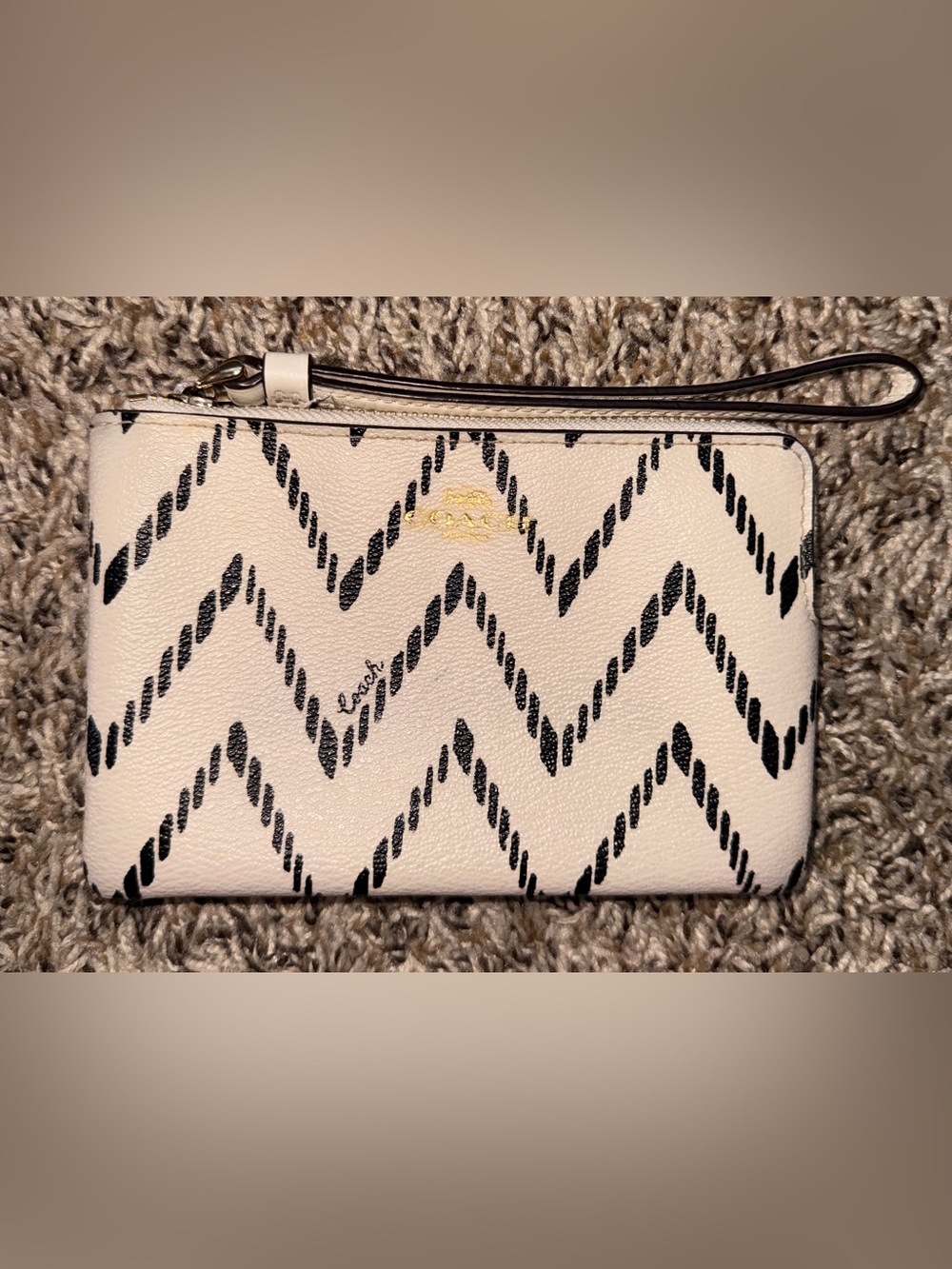 COACH Cream Leather Wristlet with Black Zigzag Print and Gold Logo